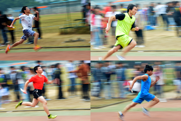 运动员在赛场上努力的奔跑